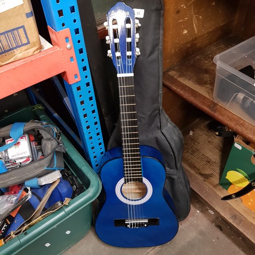 65 - A Berkeley child's size acoustic guitar, model RBC2BL, with bag.