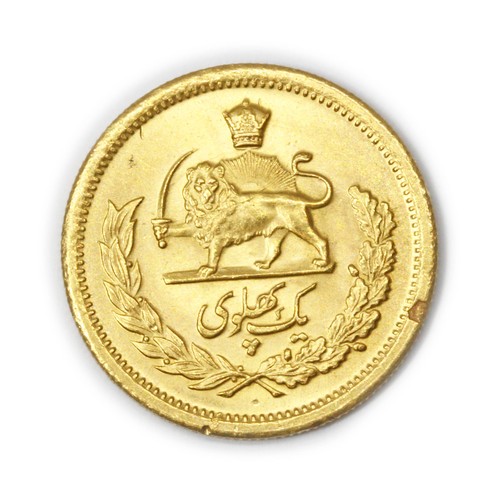 406 - An Iranian 1 Pahlavi gold coin, with head of Mohammed Reza Shah, diameter 22mm, approx. 8.1g.