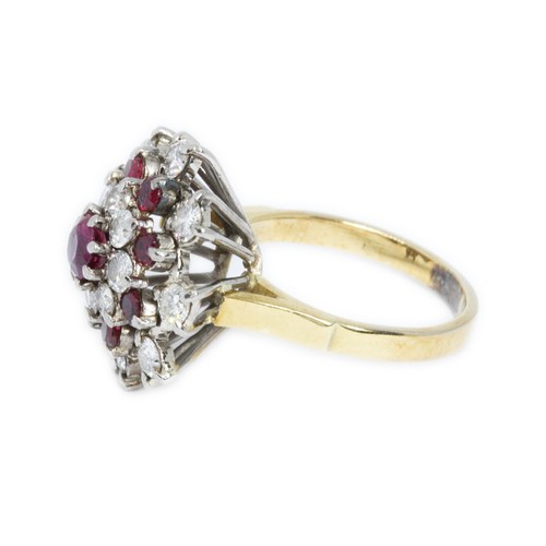 416 - A DIAMOND AND RUBY CLUSTER RING, the round brilliant cut diamonds weighing approximately 1.04cts, th... 