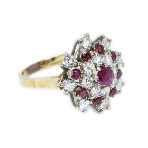 416 - A DIAMOND AND RUBY CLUSTER RING, the round brilliant cut diamonds weighing approximately 1.04cts, th... 