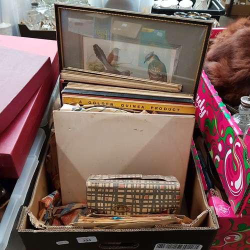 304 - A mixed box to include pictures, video camera, 45s and LPs including Beatles White Album