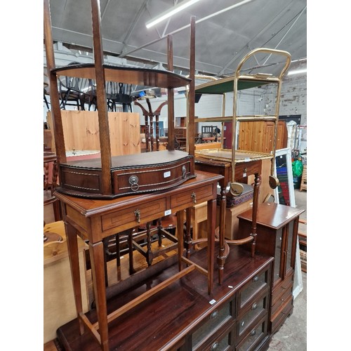 977 - A mixed lot comprising mahogany side tables, brass trolley, glazed mahogany cabinet, a Dryad table t... 