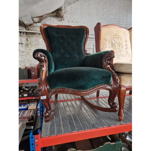 999 - A Victorian mahogany framed rocking chair.