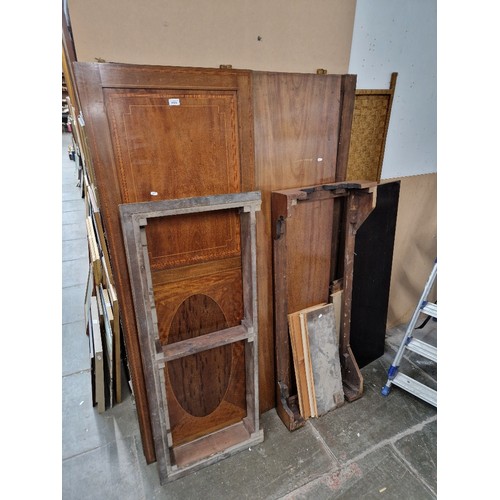 1005 - An Edwardian inlaid mahogany wardrobe.