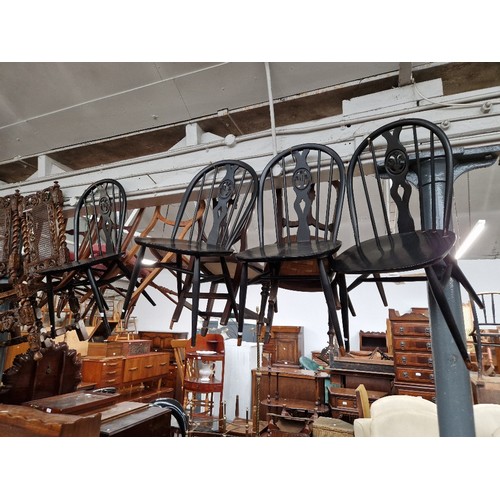 1010 - A set of four Ercol 'Fleur de Lis' dining chairs.