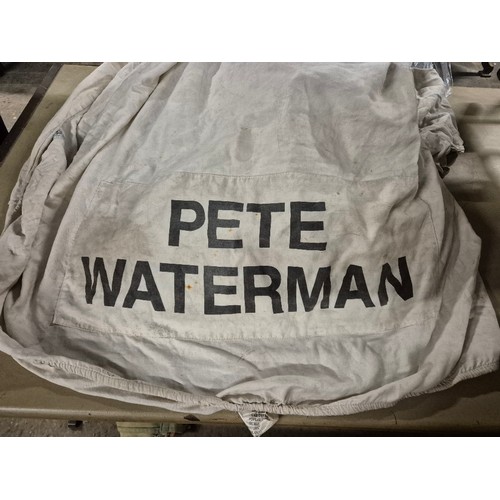 175 - A Ferrari car cover printed 'PETE WATERMAN'.