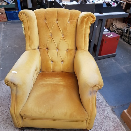 1001 - A pair of Victorian Chesterfield wingback armchairs.