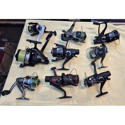 52 - A box of fishing reels including Smiano, Mitchell, etc.