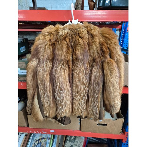 125 - Five fur coats and a faux fur including  white mink, red fox, pale mink (x2).