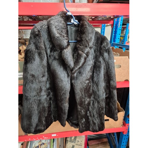 125 - Five fur coats and a faux fur including  white mink, red fox, pale mink (x2).