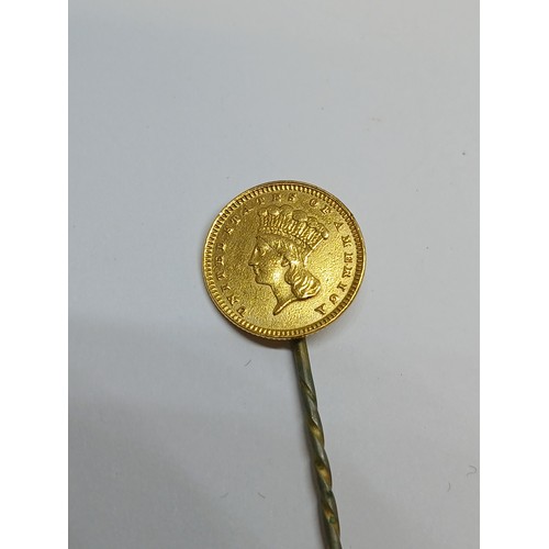 398 - A 19th century USA one dollar gold coin soldered on a stick pin.