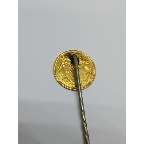 398 - A 19th century USA one dollar gold coin soldered on a stick pin.