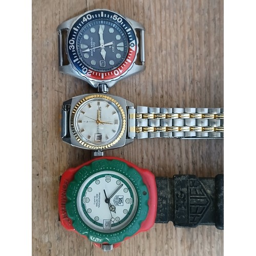 159 - A Tag Heuer 200m Professional quartz wristwatch, case diameter 35mm, a ladies Seiko and a Citizen.