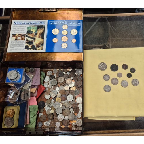 678 - Metal box with various coins to include some silver (crown etc.).