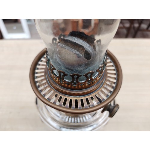 744 - A duplex glass oil lamp