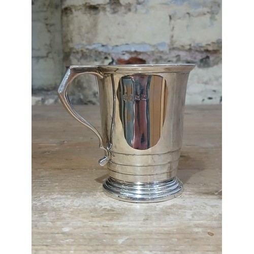 236 - A hallmarked silver tankard, height 8cm, weight 3.6ozt.