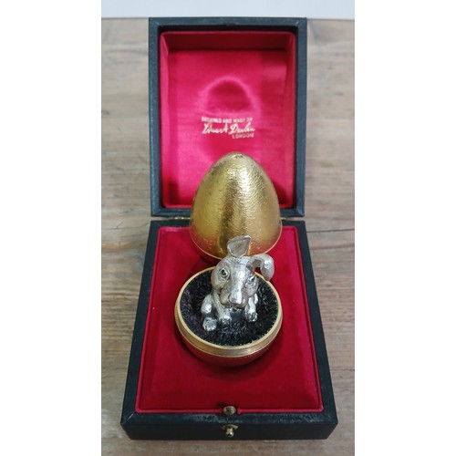 472 - STUART DEVLIN, a silver and silver gilt Surprise Egg, Rabbit, number 65, sponsor SD, London 1973, wi... 