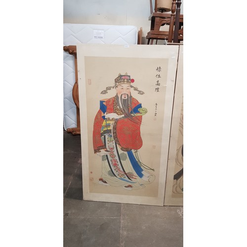 811 - A series of three Japanese paintings on silk depicting deities, 81.5cm x 149cm each (overall).  NOT ... 