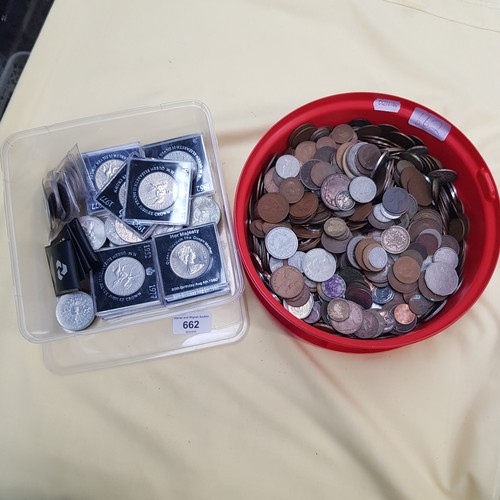 662 - Two tubs of assorted coins.