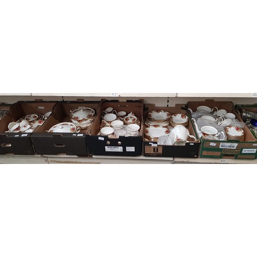 679 - Five boxes of Royal Albert 'Old Country Roses' tea and dinner wares including three teapots, coffee ... 