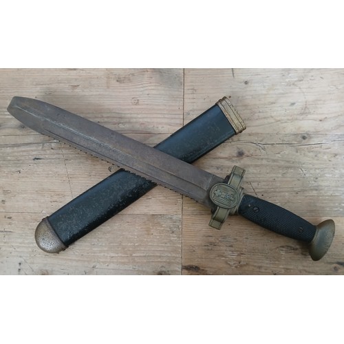 5 - A German third Reich WWII Red Cross hewer, 26.5cm saw back blade, black bakelite grip, metal scabbar... 