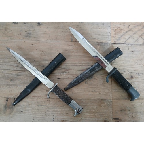 15 - Two German Third Reich K98 Parade bayonets, one by Dolf Buchel, the other unmarked, blade length 19c... 