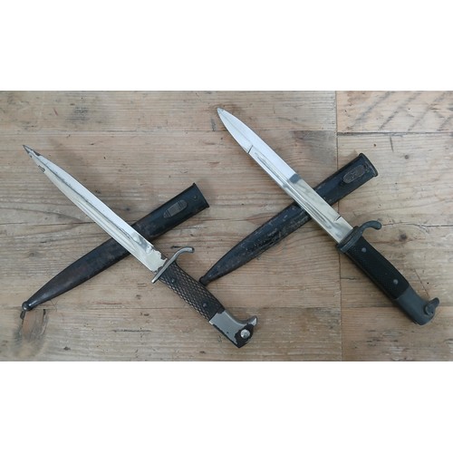 15 - Two German Third Reich K98 Parade bayonets, one by Dolf Buchel, the other unmarked, blade length 19c... 