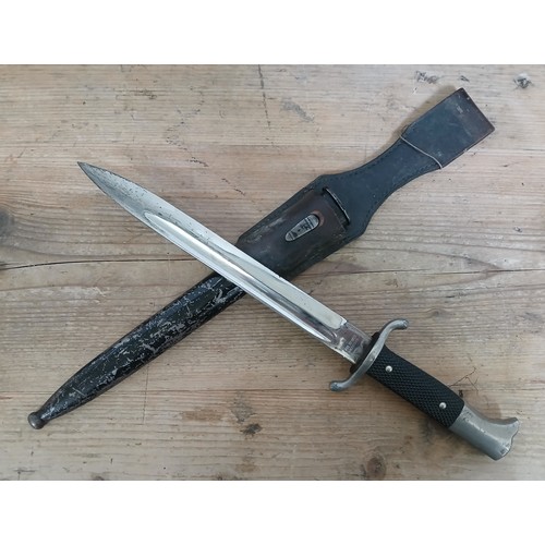 21 - A German Third Reich Fireman's Parade dagger by Carl Henkel, blade length 24.5cm, metal scabbard and... 