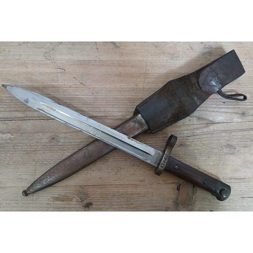 34 - A WWI M95 bayonet by Ernst Busch, blade length 25cm, metal scabbard and leather frog, total length 3... 