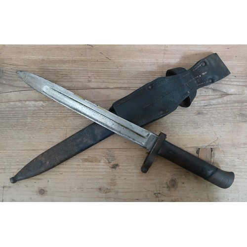 35 - A WWI Austo-Hungarian bayonet, blade length 25cm, metal scabbard and leather frog, total length 38cm... 