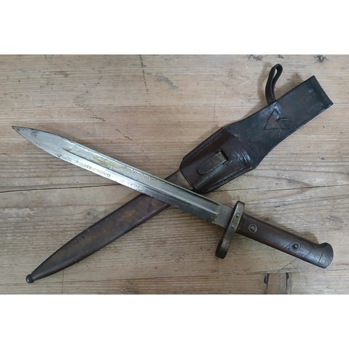 34 - A WWI M95 bayonet by Ernst Busch, blade length 25cm, metal scabbard and leather frog, total length 3... 