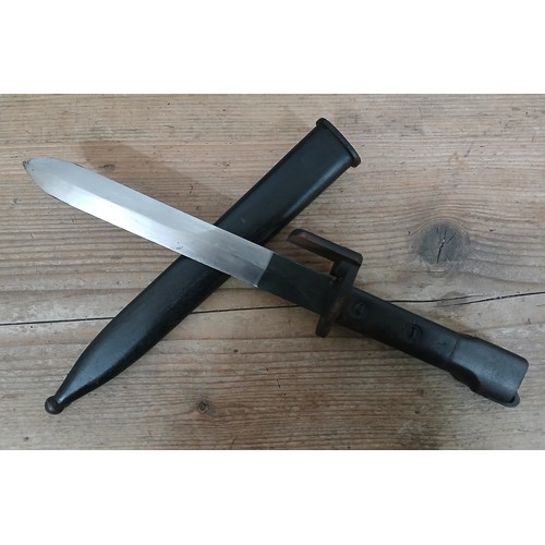 37 - A British X2E1 Trials bayonet, blade length 18cm, metal scabbard, wooden grip, total length 34cm.