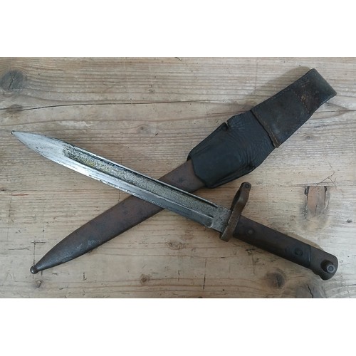 38 - A WWI Austo-Hungarian bayonet, blade length 24cm, metal scabbard and leather frog, total length 39cm... 