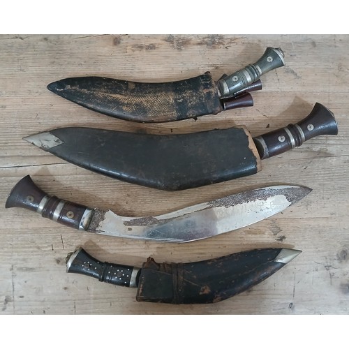 46 - A group of four assorted Kukri knives.