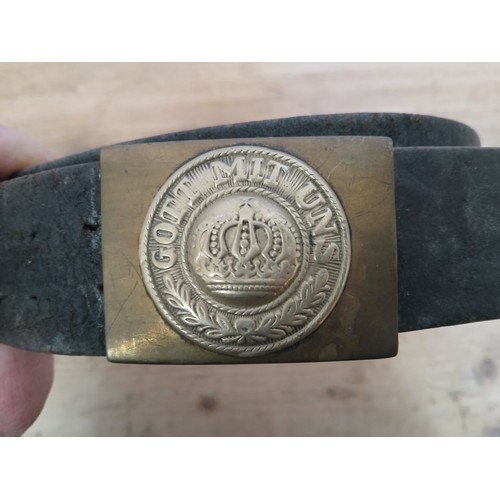 53 - A German WWI Prussian Infantryman's brass belt buckle and leather belt.