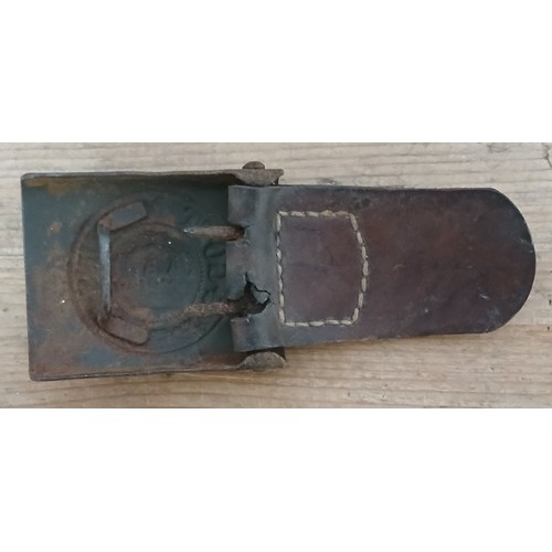 71 - An Imperial German WWI belt buckle with leather belt tab.