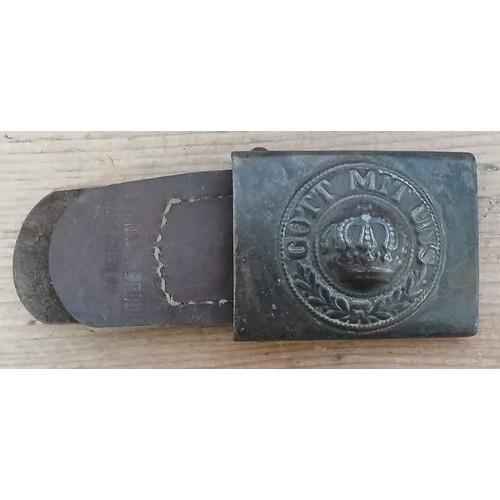 71 - An Imperial German WWI belt buckle with leather belt tab.