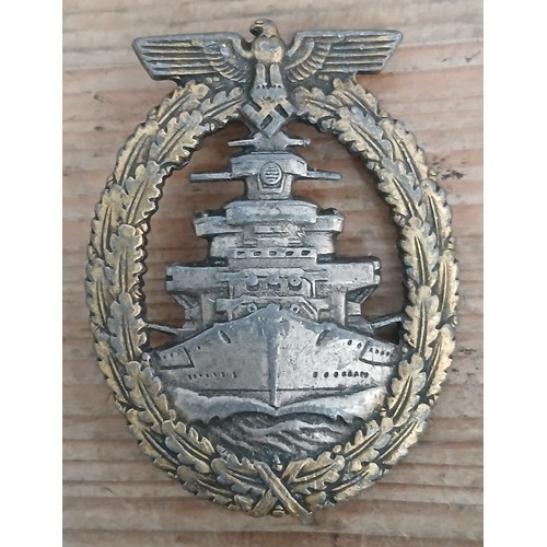 77 - A German Third Reich Kriegsmarine High Seas Fleet badge by Friedrich Orth.