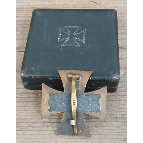 84 - A German Third Reich First Class Iron Cross, marked 595, with associated box.