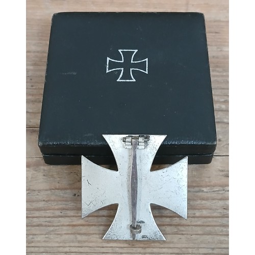 86 - A German Third Reich WWII First Class Iron Cross with associated box.