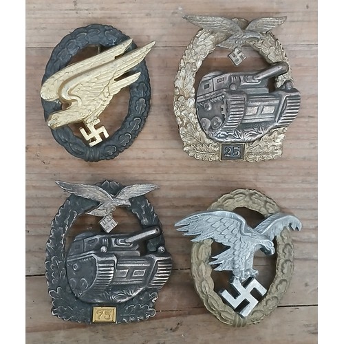 83 - A group of four post war German badges.