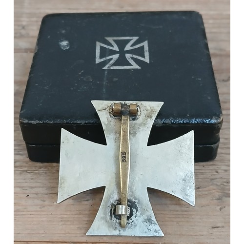 85 - A German Third Reich First Class Iron Cross, marked 595, with associated box.