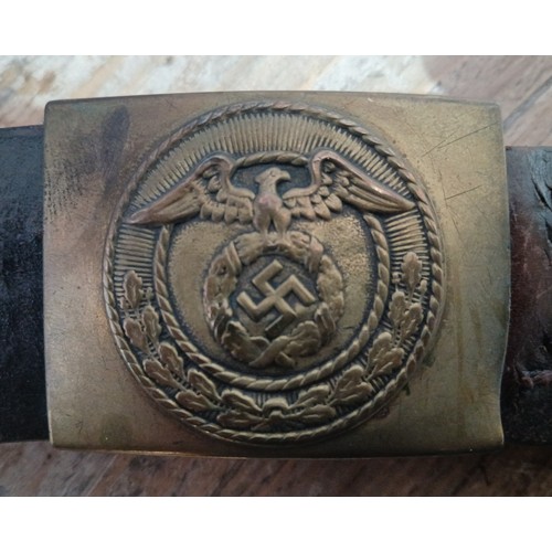 52 - A German Third Reich SA brass belt buckle and leather belt.