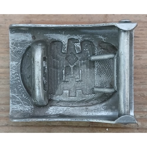 57 - A German Third Reich Red Cross belt buckle by Overhoff & Cie of Ludenscheid, cast aluminium circa 19... 