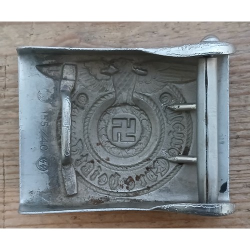 55 - A German Third Reich Waffen-SS belt buckle by Assmann & Söhne, first steel model circa 1940, stamped... 