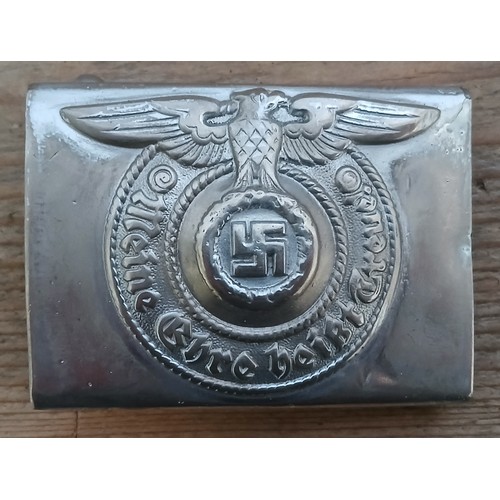 55 - A German Third Reich Waffen-SS belt buckle by Assmann & Söhne, first steel model circa 1940, stamped... 