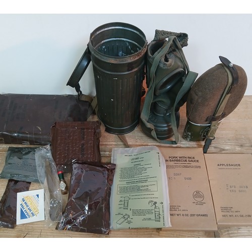 99 - Assorted military including US rations, a canister type gas mask and a billy can and water canteen.