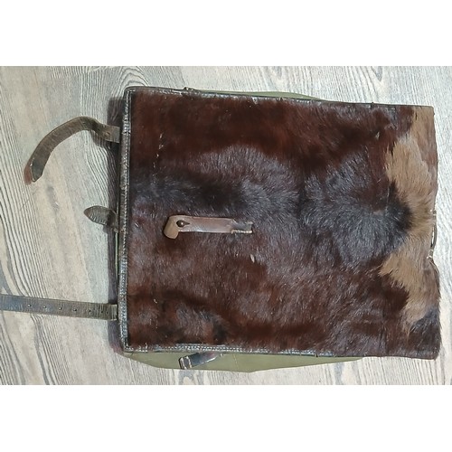 100 - A German Third Reich WWII Army Zeltbahn poncho and pony fur bag.