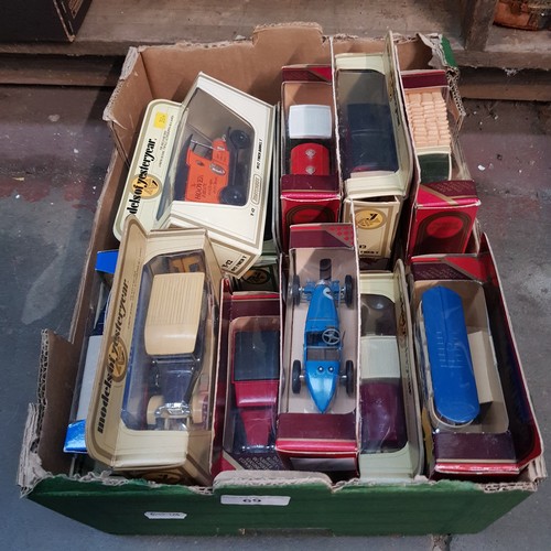 69 - A box of assorted boxed diecast model cars