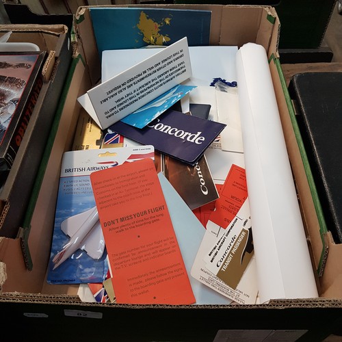 82 - A box of Concorde related ephemera including baggage labels, menus, model plane, etc